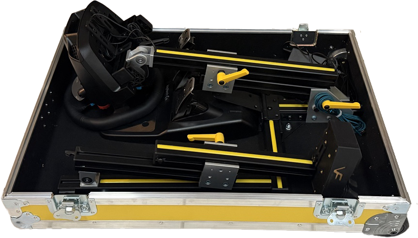 Fold N Go case open with the wheel, pedals and controls packed inside